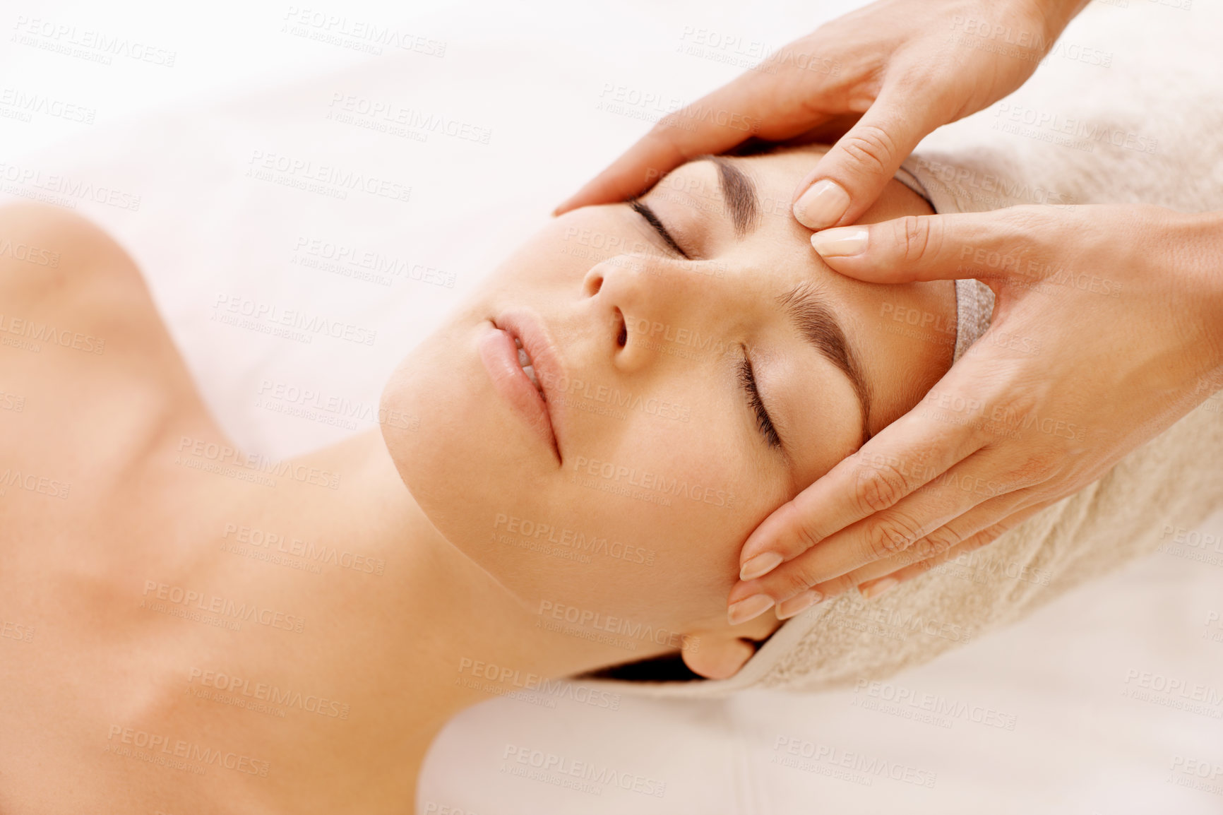 Buy stock photo Relax, woman and head massage at spa for migraine relief, luxury pamper or holistic treatment. Above, client or beauty therapist with forehead rub for tension release, self care or wellness at resort
