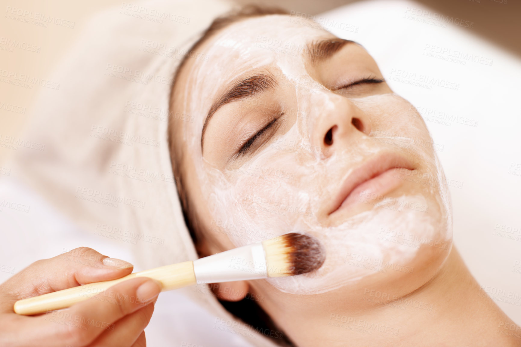 Buy stock photo Beauty, facial and brush with woman in spa for pore detox, skincare or deep cleaning cosmetics. Clay treatment, glow and face mask with person and hands in salon for purifying minerals and relax