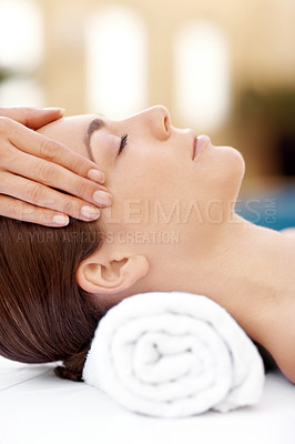 Buy stock photo Profile shot of a beautiful woman receiving a massaging spa treatment from a therapist 