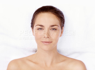 Buy stock photo Beautiful woman waiting for her spa treatment to begin with a smile - portrait 