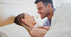 Relax, smile or couple in bed with love, romantic moment or bonding together on weekend break. Chill, comfy or people in house with cuddle, partner care or tender connection in happy relationship.