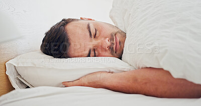 Buy stock photo Sleeping, tired and peace with man in bedroom of apartment for fatigue, resting and comfortable. Relaxing, eyes closed and dreaming with male person in home for chill, exhausted and calm break