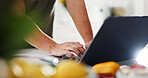 Laptop, recipe and typing with hands in kitchen for meal prep guide, social media and ingredient list. Food blog, cooking tutorial and search with person in home for streaming and online post