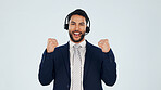 Business, man and fist pump in studio with headset, customer praise or success of sales kpi. Portrait, mockup space or agent cheering for good news, technical support and helpdesk on white background
