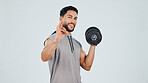 Man, OK sign and dumbbell in studio for fitness approval, feedback or review with gesture for weightlifting. Vote, person and portrait with weights for muscle growth, agreement and background space