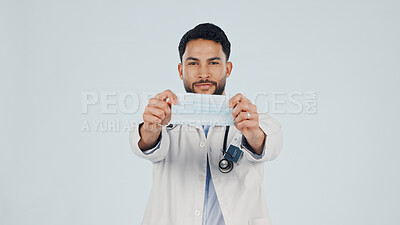 Buy stock photo Portrait, man and doctor in studio with face mask, demonstration or medical safety for hygiene. Mockup space, male person or ppe for compliance, healthcare protocol and protection on white background