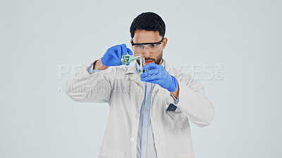 Buy stock photo Scientist, man and pour chemical for experiment, pharma development and space in studio. Liquid, chemistry beaker and person with drug synthesis, medical research and study on white background