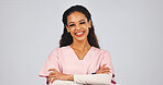 Medical, portrait or doctor in studio with arms crossed, ambition and about us in wellness industry. Happy, space or woman with confidence, career growth or health practitioner on white background.
