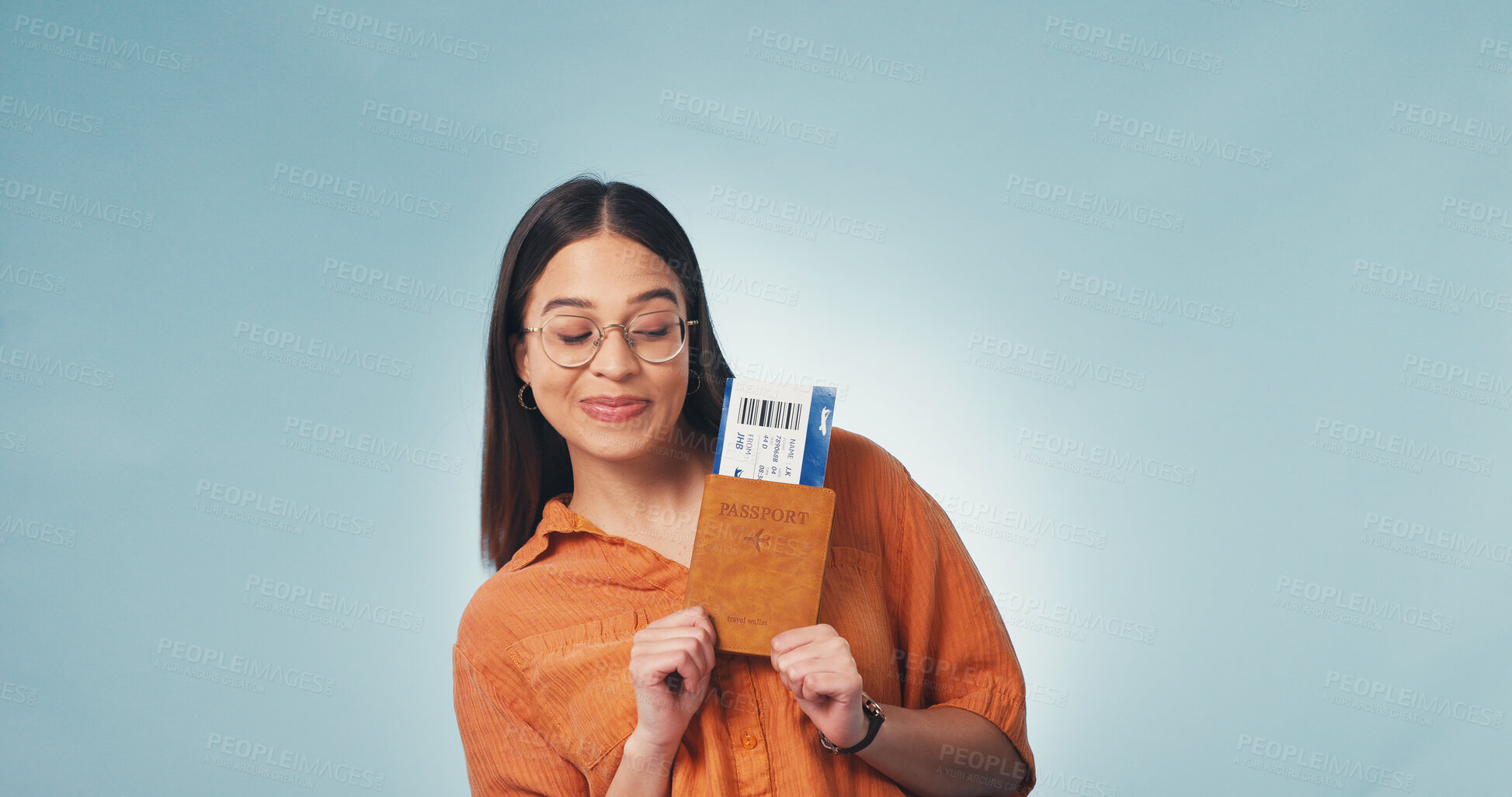Buy stock photo Pride, happy or woman in studio with passport, entry record or boarding pass in travel goals. Flight ticket, space or person with credentials, granted permit or tourist milestone on blue background.