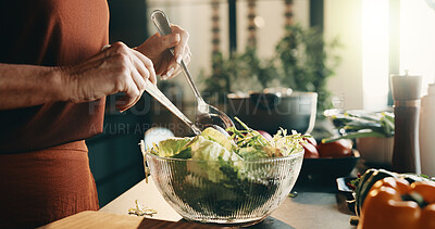 Buy stock photo Salad, spoon and hands of woman in kitchen at house for nutrition, health or diet meal. Vegetables, glass bowl and female person with fresh ingredients for wellness, dinner or dish in apartment.