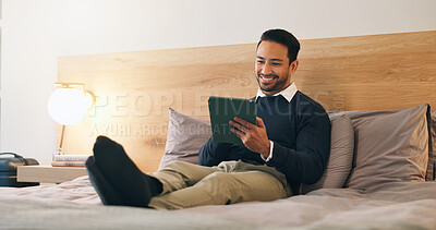 Buy stock photo Business, man and relax in hotel room with tablet, booking flight and website for work trip. Smile, male person and employee at motel with tech, departure schedule and reservation checkin for travel