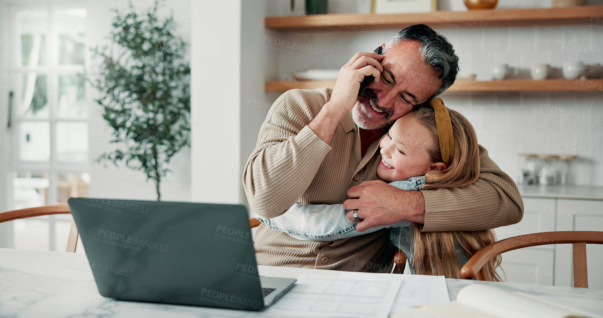 Buy stock photo Phone call, hug and father with child in home with remote work for creative project with good news. Laptop, happy and mature dad embracing girl on mobile discussion for feedback on freelance article