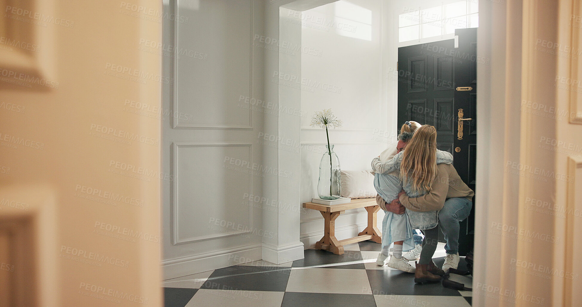 Buy stock photo Hug, children and dad in home for greeting, anticipation and care for homecoming. Daughters, father and embrace by front door for welcome, family reunion and bonding together for parent arrival