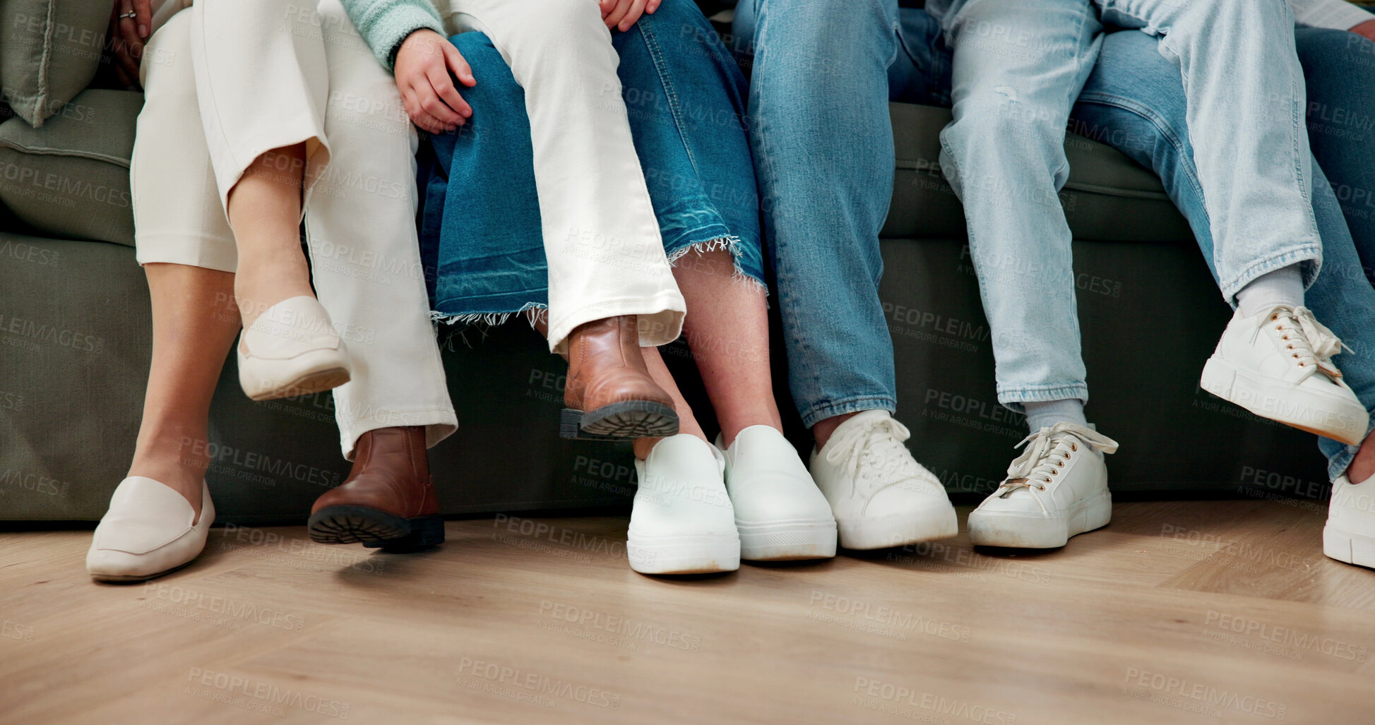 Buy stock photo Legs, family and relax on sofa for bonding together, kids and parents on break with connection in house. Shoes, children and people on couch in living room, chill or love with comfort at home
