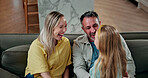 Talk, child and parents with laugh on sofa for funny conversation, happy home and weekend break. Love, family and girl with chat in living room for relationship development, bonding and kid with joke