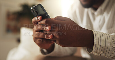 Buy stock photo Texting, chat and hands in home with phone, online communication and post reaction on social media app. Digital, typing and man with technology, message update or networking on virtual platform