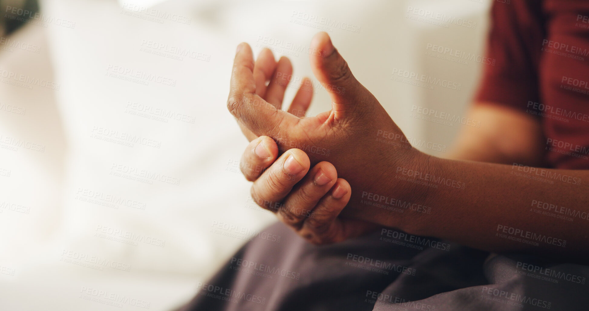 Buy stock photo Fibromyalgia, hand and massage with person in home living room for joint pain, stiffness or swelling. Arthritis, disease or osteoporosis with elderly woman on sofa in apartment for health condition