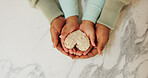 Hands, parent and child with heart for sandwich, love and support with nutrition and wellness in home. Family, people and kid with bread, food and above with symbol for snack or bonding in kitchen