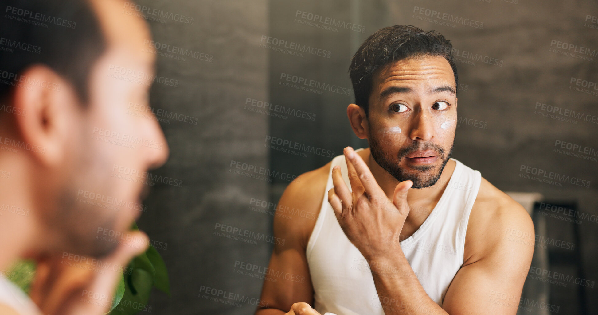 Buy stock photo Lotion, mirror and skincare with man in bathroom of home for morning hydration routine. Daily beauty, moisturizer and reflection with person in apartment to apply cream for antiaging treatment