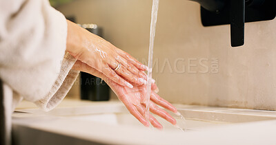 Buy stock photo Basin, washing hands and water with woman in bathroom for hygiene, skincare or wellness. Cleaning, disinfection and wet with person at apartment sink to remove bacteria, dirt or germs for maintenance