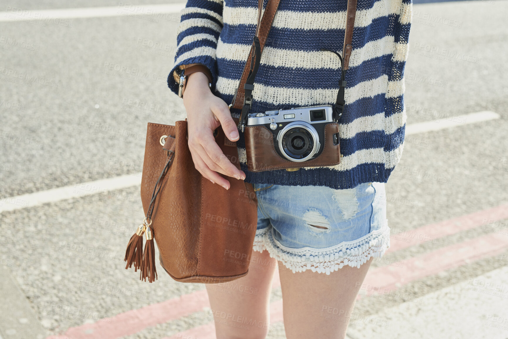 Buy stock photo Camera, hands and tourism with woman outdoor on street in city for sightseeing or travel. Holiday, photography and vacation with tourist on sidewalk to explore destination for commute or memories