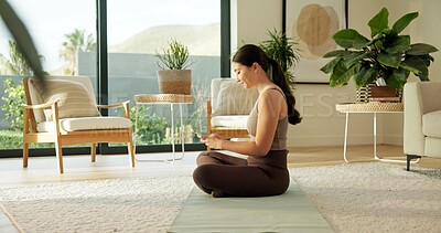 Buy stock photo Yoga mat, phone and woman in home for social media, health app and wellness article for fitness. Apartment, typing and person on cellphone for research, internet and website for pilates or exercise