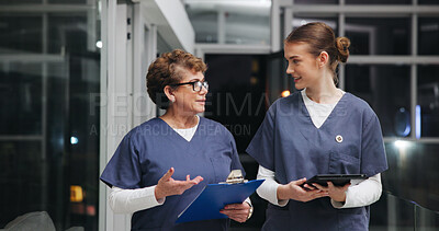 Buy stock photo Hospital, medical team and discussion with checklist, nurse and women with mentor for advice at night. Surgeon, tablet and people in clinic with clipboard, training or healthcare schedule on overtime
