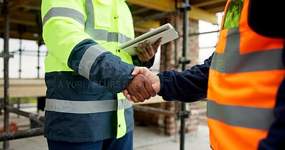 Buy stock photo Men, shaking hands and tablet on construction site for agreement, development deal and welcome. Engineer, team and handshake with tech for partnership and renovation collaboration at scaffolding