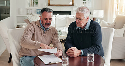 Buy stock photo Man, advisor and talking in home with documents, finance report and form for loan application. Mature people, consultant and reading at house with paperwork, financial clipboard and retirement policy