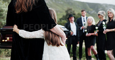 Buy stock photo Hug, mother and girl in graveyard, back or emotion for grief, bereavement or compassion. People, parent or daughter with support for funeral, sad or burial for death, empathy or healing with mourning