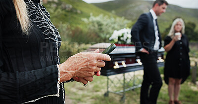 Buy stock photo Funeral, hands and old woman in graveyard, smartphone for online chatting or post for memory. Family, loss or mature person in cemetery, cellphone or message to contact, communication or social media