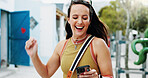 Excited, woman and winning with phone in park for discount, amazing deal or promotion. Happy, female person or fist pump with smile, mobile smartphone or app for good news, achievement or bonus