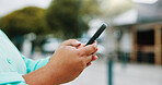 Person, hands and tourist with phone in city for navigation, travel app, or tourism destination. Traveler, user or location with network service, web or connection for outdoor trip or online tracking