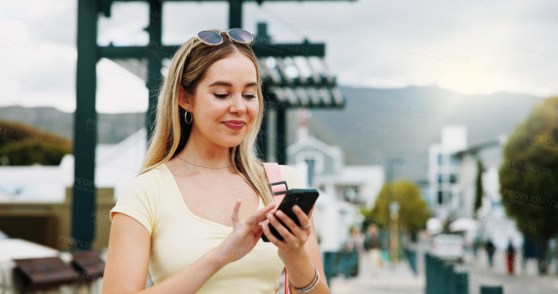 Buy stock photo Happy, woman and scroll in city with phone, social media update and notification for text message. Happy, person and typing outdoor in urban town with tech, browsing website and online dating app.