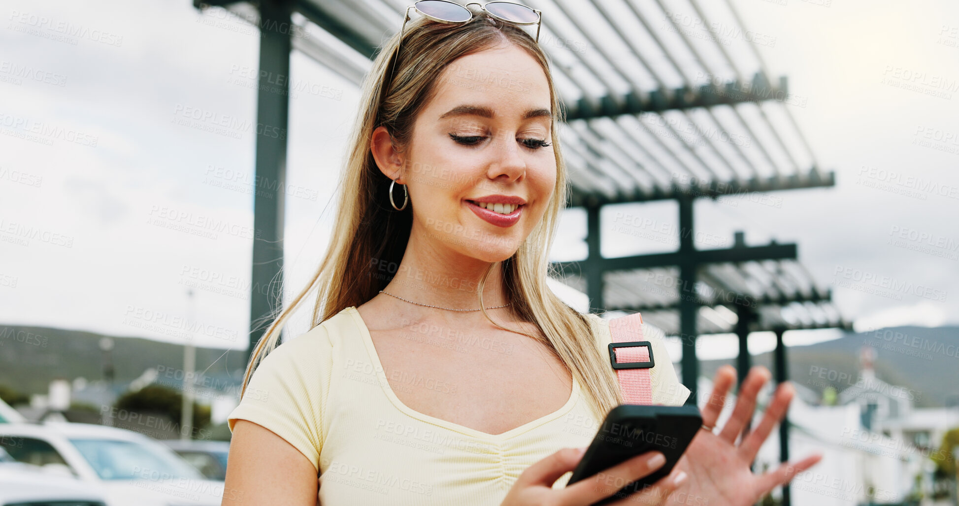 Buy stock photo Happy woman, travel and social media with phone in city for network connection or outdoor guide. Female person, traveler or user with smile on mobile smartphone for tourism app or navigation in town