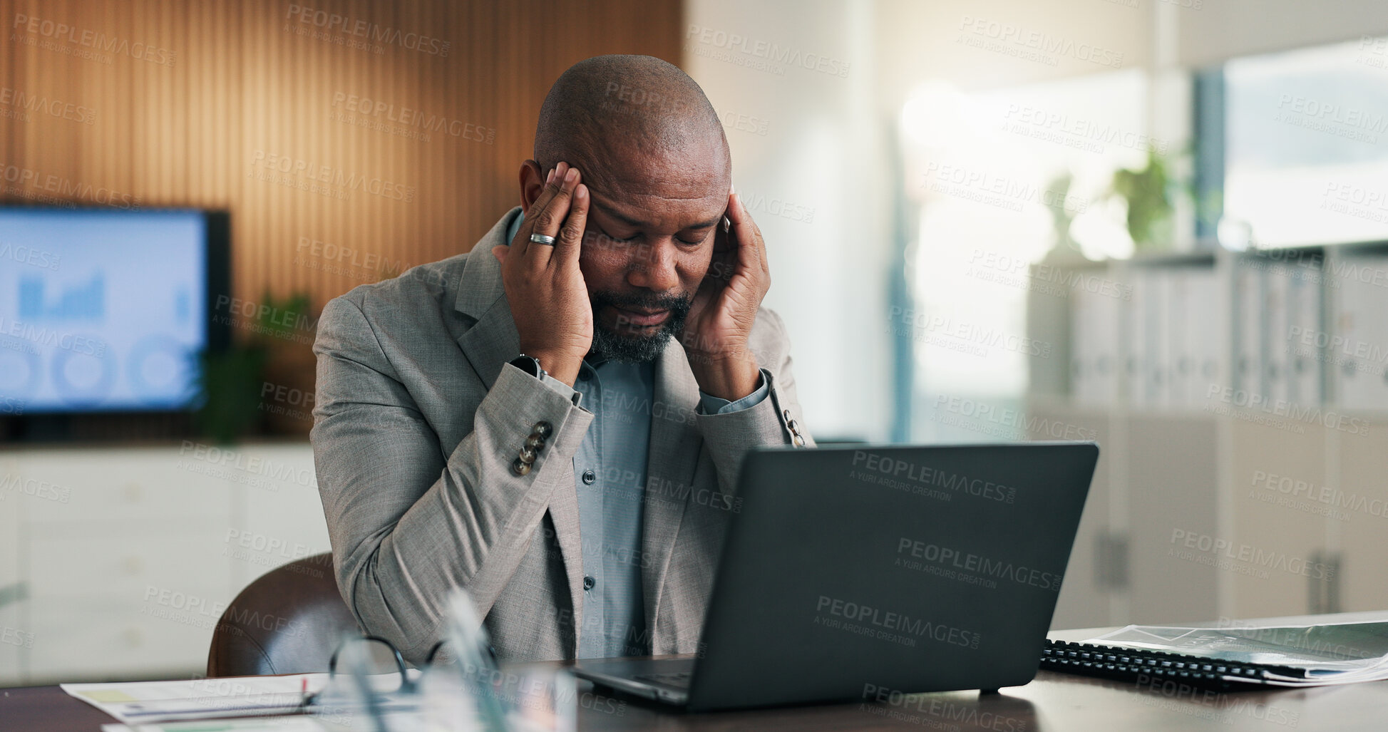 Buy stock photo Business, office and black man on laptop with headache, mistake and financial crisis for bankruptcy. Frustrated, migraine and mature person on computer with burnout, investment fail and overworked