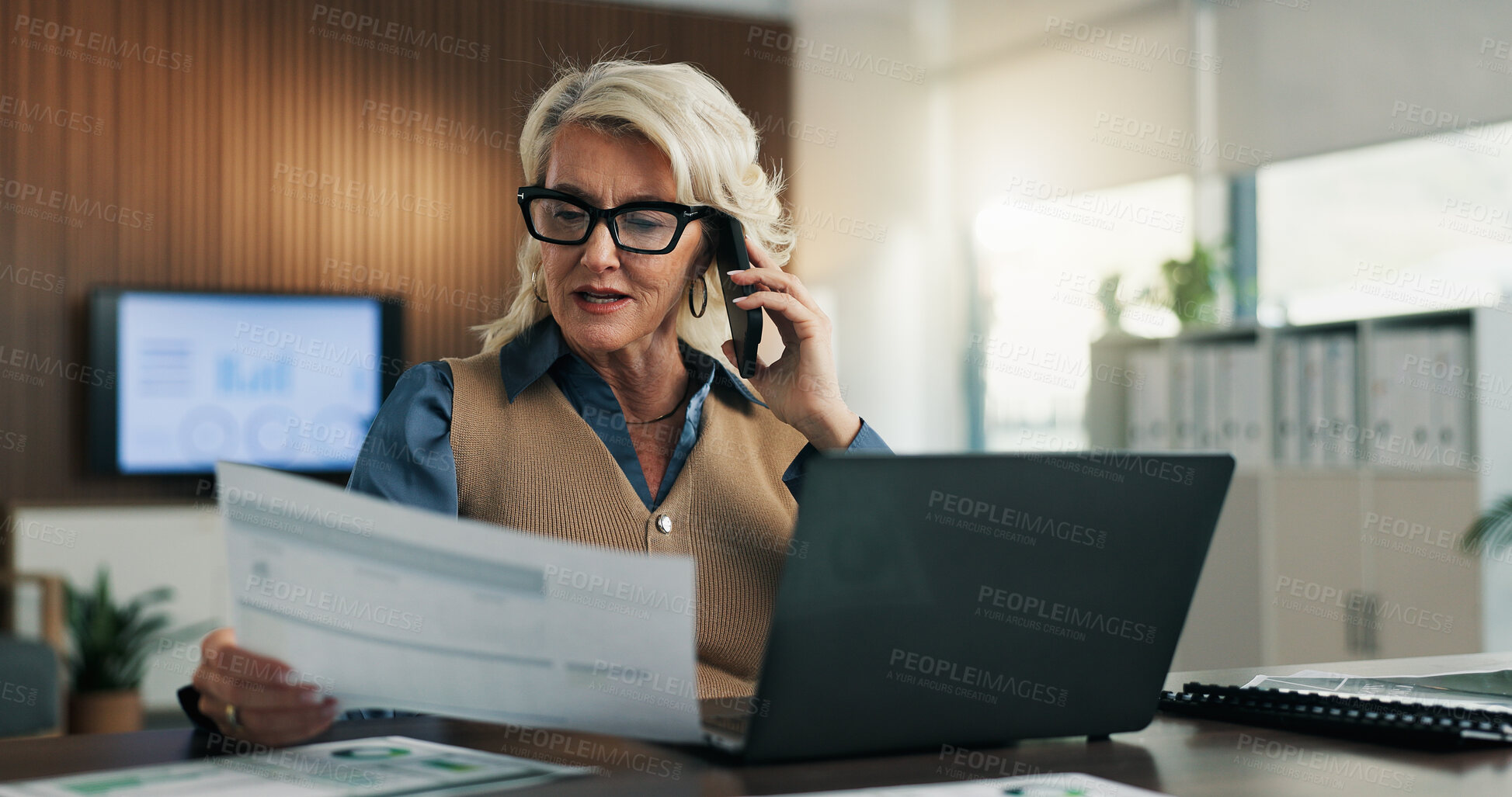 Buy stock photo Laptop, phone call and woman in company with document for accounting, audit data and budget update. Contact, auditor or mature person with paperwork for bookkeeping analysis, tech or financial review