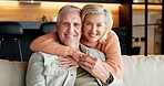 Portrait, home and senior couple with smile, embrace or laughing with partner on break and affection. Happy, mature people and bonding with spouse on weekend, hug and commitment for marriage in house