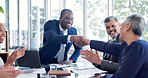 Applause, celebration and handshake with business people in boardroom together for goals or target. Achievement, clapping and success with team shaking hands in office for meeting or milestone
