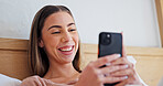 Bed, home and happy woman with phone for social media, online chatting or communication. Female person, user or smile with mobile smartphone in bedroom for texting app, network or connection in house