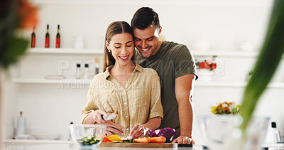Buy stock photo Cooking, hug and wellness with couple in kitchen of home together for diet or nutrition. Healthy food, ingredients and recipe with happy people embracing in apartment for morning meal preparation