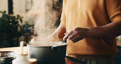Buy stock photo Cooking, hands and man in kitchen with pot, recipe and meal prep for dinner, lunch or supper. Home, stir and person by stove with ingredients, boiling and steam for nutrition, health and cuisine