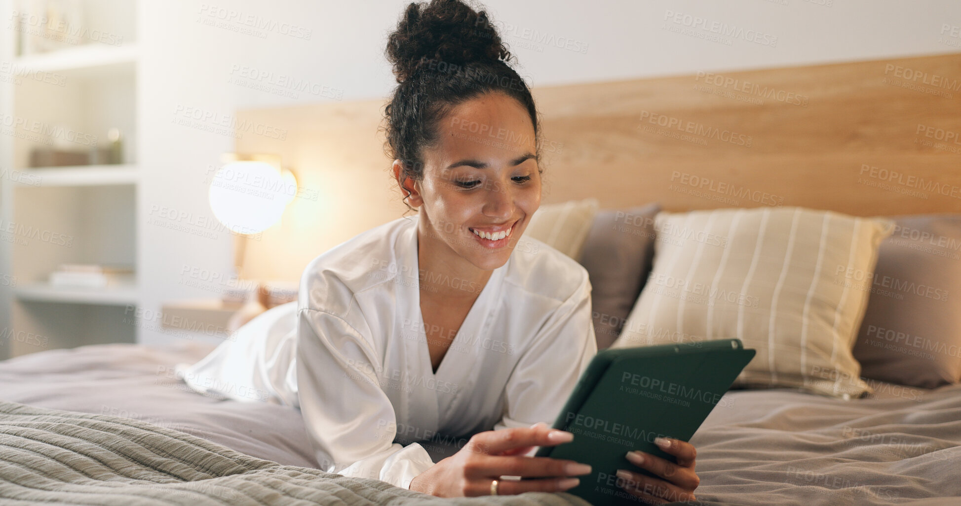 Buy stock photo Reading, online and woman with tablet on bed, entertainment and resting with subscription in bedroom. Digital, ebook and happy person with technology, internet connection and novel download in house