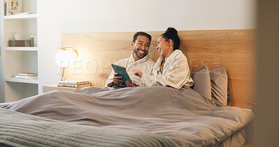 Buy stock photo Couple, laughing and bonding with tablet in bedroom, entertainment and funny videos on social media. Streaming, comedy and happy people with tech, internet connection and rest with partner in home