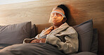 Red light, mask and woman in bed with skincare for beauty, wellness and collagen production. Health, relax and person in bedroom with LED phototherapy for dermatology or facial treatment in home