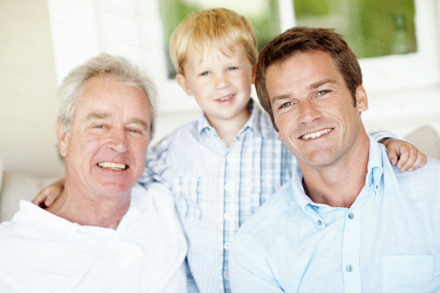 Buy stock photo Family, relax and kid at house with smile, love and bonding together with affection. Portrait, father or grandfather embrace in living room with child, connection and generations relationship in home