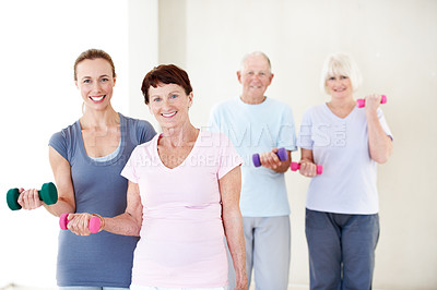 Buy stock photo Portrait, dumbbells and old people in gym class with personal trainer, guidance or workout for wellness. Happy, fitness coach and senior person in retirement with exercise, help or strength training.