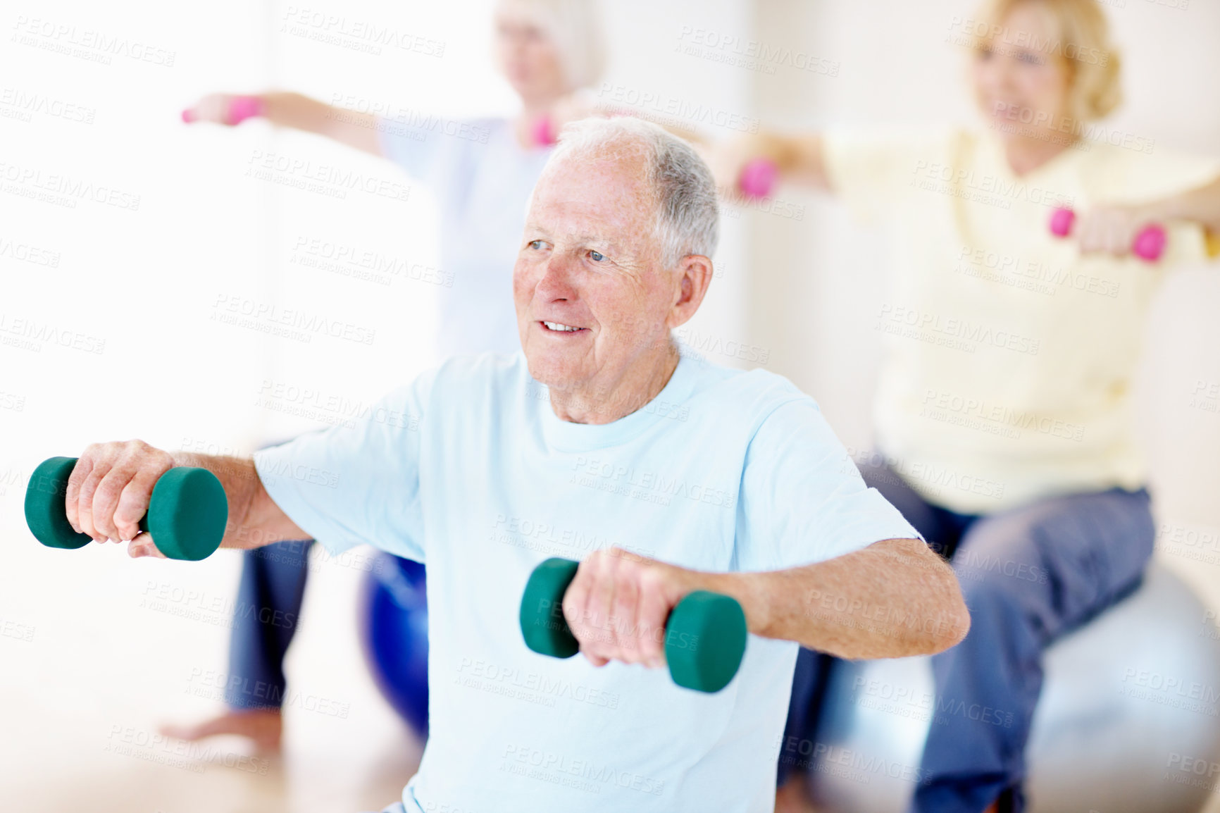 Buy stock photo Fitness, weights and senior man in class for exercise, wellness and training for mobility. Retirement, gym and elderly people with dumbbells and medicine ball for health, muscle strength and workout
