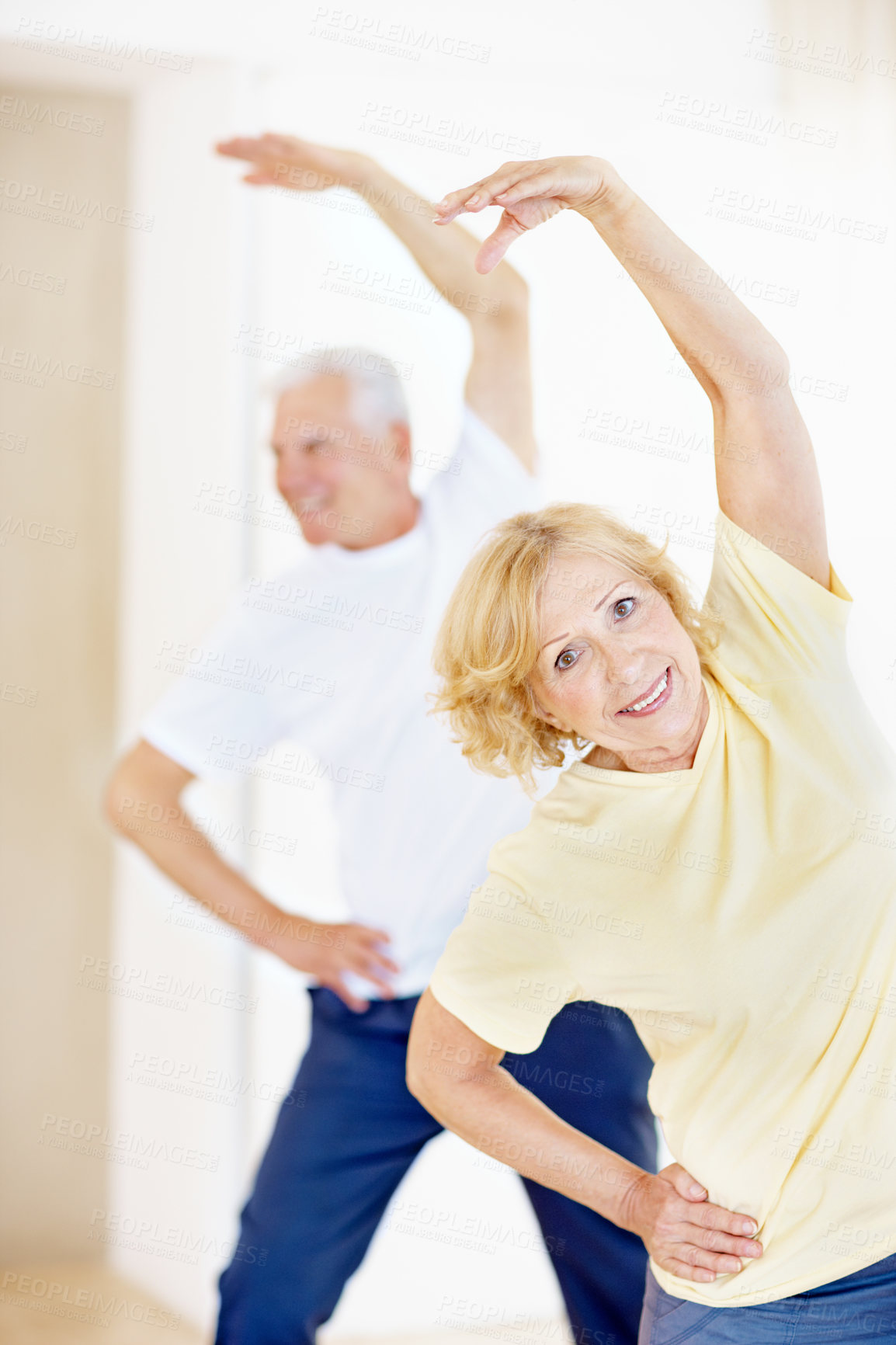 Buy stock photo Stretching, portrait and old woman with husband in yoga class, happy and balance in retirement home. Senior resident, smile and couple in health club for mobility exercise, fitness and cardio