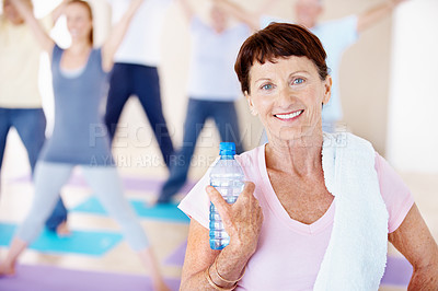 Buy stock photo Portrait, break or old woman in gym class with water, cardio rest or group fitness in workout hobby. Smile, towel or senior person with drink, cool down or hydration recovery in retirement training.